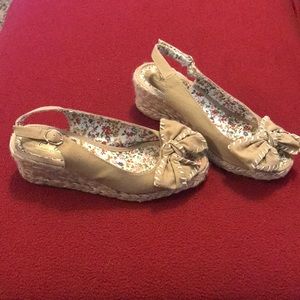 Super cute tan sandals with wedge heel